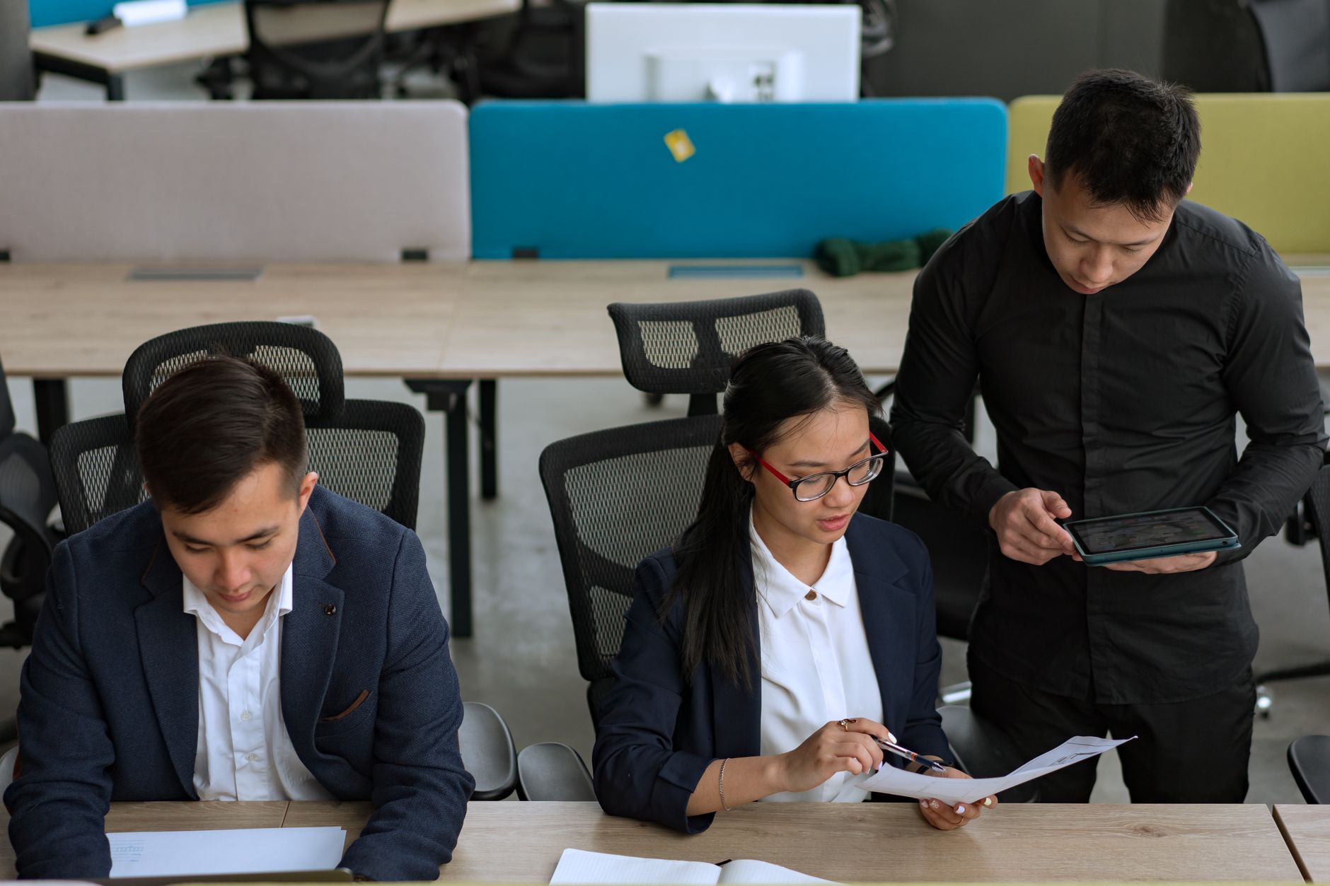 Professional team working in bright modern office environment